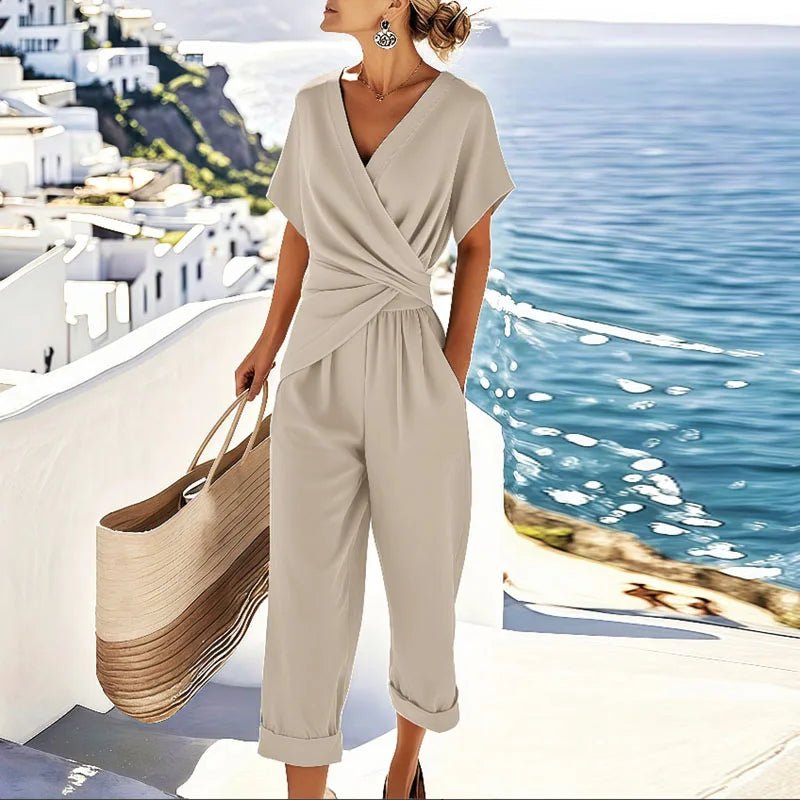 Women's jumpsuit featuring a stylish V-neck and short sleeves, perfect for elegant casual summer outings. 0